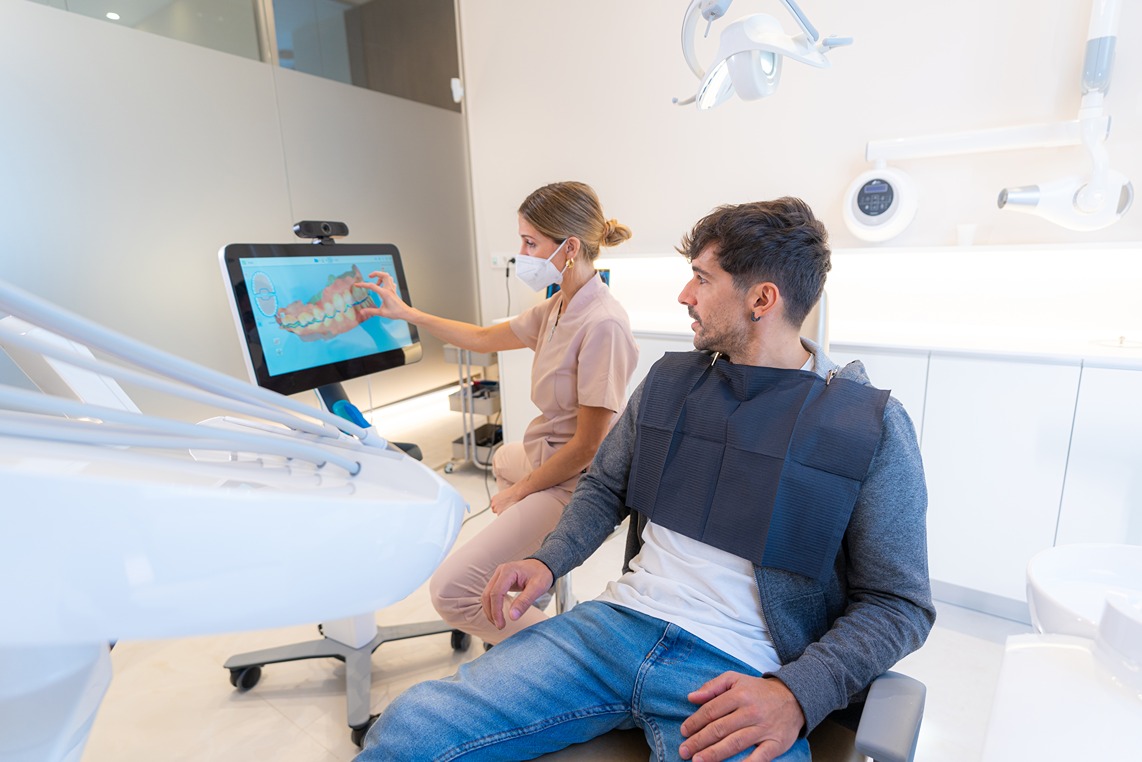 Patient reviewing a clear aligner treatment plan.